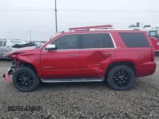 2015 Chevrolet Tahoe LTZ z VIN 1GNSKCKC6FR276531, wystawiony jako IAAI lot #41692617 z przebiegiem 124 010 mil mil oraz . Historia ofert i sprzedaży dostępna na DreamBid. Obrazek 14.