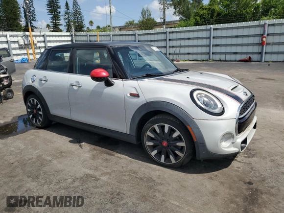 2017 MINI Hardtop 4 Door Cooper S with VIN WMWXU3C55H2D33015, listed as a Copart auction lot 63756435 with 63,596 mi miles and Salvage title. Bid and sale history available at DreamBid. Image 4.
