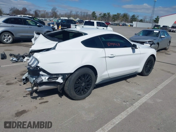 2022 Ford Mustang EcoBoost with VIN 1FA6P8TH0N5139048, listed as a IAAI auction lot 42049179 with 13,440 mi miles and . Bid and sale history available at DreamBid. Image 4.