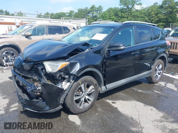 2016 Toyota RAV4 XLE with VIN 2T3RFREV9GW458057, listed as a IAAI auction lot 42651373 with 119,750 mi miles and . Bid and sale history available at DreamBid. Image 18.
