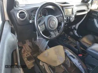 2014 Jeep Wrangler Sahara with VIN 1C4AJWBG1EL168007, listed as a Copart auction lot 87331394 with 113,228 mi miles and Salvage Title. Bid and sale history available at DreamBid. Image 8.
