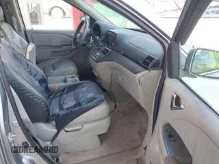 2007 Honda Odyssey EX-L z VIN 5FNRL38657B116038, wystawiony jako IAAI lot #42365429 z przebiegiem 177 518 mil mil oraz . Historia ofert i sprzedaży dostępna na DreamBid. Obrazek 5.