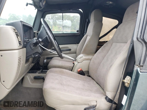 2003 Jeep Wrangler Sport with VIN 1J4FA49S03P330858, listed as a Copart auction lot 59519085 with Not provided miles and Salvage title. Bid and sale history available at DreamBid. Image 7.