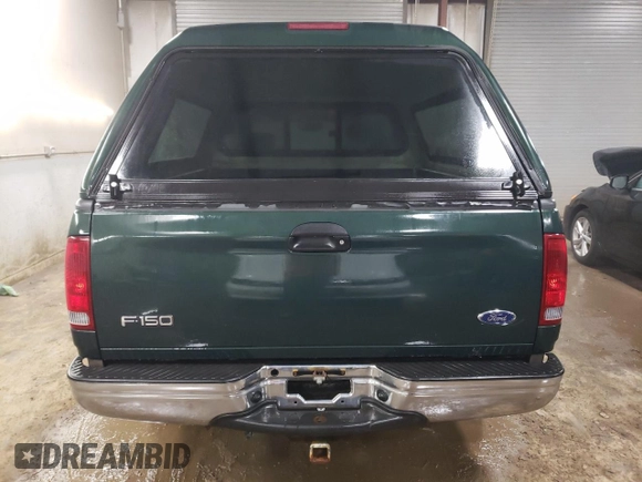 2002 Ford F-150 XL with VIN 1FTRX17L22NB97610, listed as a Copart auction lot 47186355 with 70,767 mi miles and Salvage title. Bid and sale history available at DreamBid. Image 6.