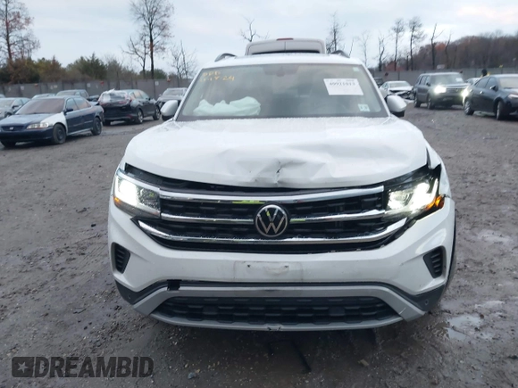 2022 Volkswagen Atlas SE z VIN 1V2KR2CA1NC555087, wystawiony jako IAAI lot #40921013 z przebiegiem 62 834 mil mil oraz . Historia ofert i sprzedaży dostępna na DreamBid. Obrazek 12.