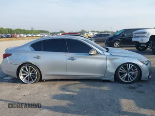 2019 Infiniti Q50 Luxe z VIN JN1EV7APXKM516277, wystawiony jako IAAI lot #41751440 z przebiegiem 52 638 mil mil oraz . Historia ofert i sprzedaży dostępna na DreamBid. Obrazek 14.