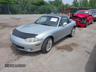 2002 Mazda MX-5 Miata Cloth with VIN JM1NB353420219700, listed as a IAAI auction lot 42510532 with 168,498 mi miles and . Bid and sale history available at DreamBid. Image 2.