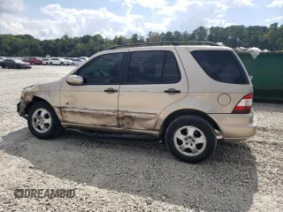 2002 Mercedes-Benz M-Class with VIN 4JGAB54E72A322046, listed as a Copart auction lot 74393084 with 128,015 mi miles and Salvage Title. Bid and sale history available at carsss.com. Image 2.