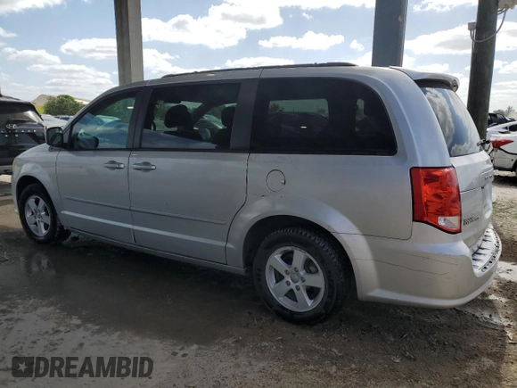 2012 Dodge Grand Caravan SXT with VIN 2C4RDGCG3CR373377, listed as a Copart auction lot 54604805 with 168,067 mi miles and Salvage Title. Bid and sale history available at DreamBid. Image 2.