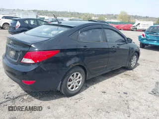 2012 Hyundai Accent GLS with VIN KMHCT4AE1CU260048, listed as a IAAI auction lot 42056125 with 168,530 mi miles. Bid and sale history available at carsss.com. Image 4.
