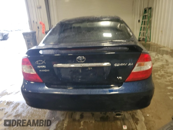 2003 Toyota Camry LE z VIN 4T1BF30K23U058761, wystawiony jako Copart lot #51286985 z przebiegiem 90 143 mil mil oraz Nie do naprawy • Non repairable. Historia ofert i sprzedaży dostępna na DreamBid. Obrazek 6.