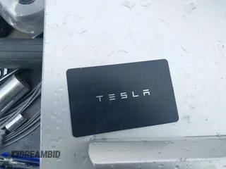 2019 Tesla Model 3 Mid Range z VIN 5YJ3E1EA1KF426824, wystawiony jako IAAI lot #41787234 z przebiegiem 69 879 mil mil oraz . Historia ofert i sprzedaży dostępna na DreamBid. Obrazek 11.