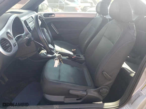 2012 Volkswagen Beetle 2.5L w/Sun PZEV with VIN 3VWJP7AT6CM601557, listed as a Copart auction lot 68744194 with 71,713 mi miles and Salvage Title. Bid and sale history available at carsss.com. Image 7.