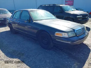 1998 Ford Crown Victoria Police with VIN 2FAFP71WXWX184526, listed as a IAAI auction lot 41563307 with 309,303 mi miles. Bid and sale history available at carsss.com. Image 1.