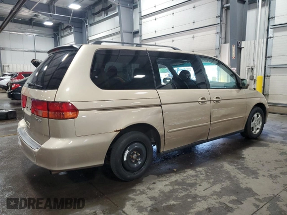 2000 Honda Odyssey EX with VIN 2HKRL1875YH611548, listed as a Copart auction lot 56593275 with 191,533 mi miles and Salvage title. Bid and sale history available at DreamBid. Image 3.