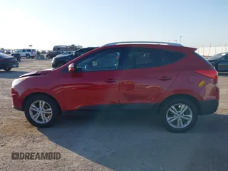 2013 Hyundai Tucson GLS with VIN KM8JU3AC6DU763590, listed as a IAAI auction lot 41999555 with 149,960 mi miles. Bid and sale history available at carsss.com. Image 14.