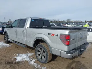 2011 Ford F-150 XLT with VIN 1FTFW1ET9BFB82704, listed as a IAAI auction lot 41238052 with 175,590 mi miles. Bid and sale history available at carsss.com. Image 3.