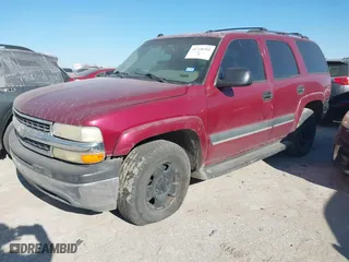 2004 Chevrolet Tahoe LT with VIN 1GNEC13ZX4R166600, listed as a IAAI auction lot 41728301 with 245,044 mi miles. Bid and sale history available at carsss.com. Image 2.