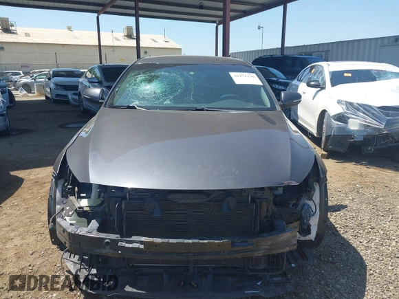 2015 Kia Optima LX z VIN KNAGM4A72F5621710, wystawiony jako IAAI lot #42171130 z przebiegiem 131 924 mil mil oraz . Historia ofert i sprzedaży dostępna na DreamBid. Obrazek 13.