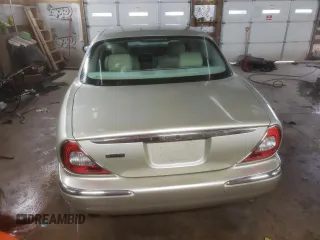 2006 Jaguar XJ with VIN SAJWA79B56SH07388, listed as a Copart auction lot 80636334 with 134,608 mi miles and Salvage Title. Bid and sale history available at carsss.com. Image 6.