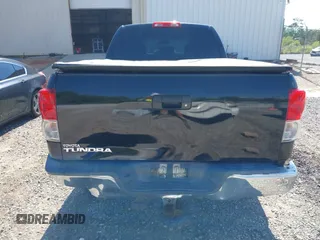 2012 Toyota Tundra z VIN 5TFRY5F17CX127160, wystawiony jako IAAI lot #42256016 z przebiegiem 203 648 mil mil oraz . Historia ofert i sprzedaży dostępna na DreamBid. Obrazek 16.