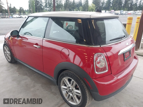 2012 MINI Hardtop with VIN WMWSU3C58CT262077, listed as a IAAI auction lot 42140178 with 70,099 mi miles and . Bid and sale history available at DreamBid. Image 3.
