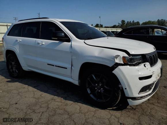 2019 Jeep Grand Cherokee Limited X with VIN 1C4RJFBT6KC694189, listed as a Copart auction lot 69828074 with 87,479 mi miles and Salvage Title. Bid and sale history available at carsss.com. Image 4.