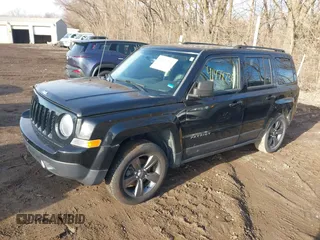 2014 Jeep Patriot High Altitude with VIN 1C4NJPFAXED888929, listed as a IAAI auction lot 41474736 with 117,697 mi miles and . Bid and sale history available at carsss.com. Image 2.