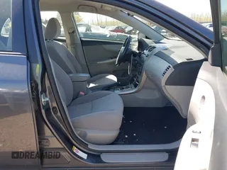 2011 Toyota Corolla L with VIN JTDBU4EE4B9144190, listed as a IAAI auction lot 42060728 with 115,299 mi miles. Bid and sale history available at carsss.com. Image 5.