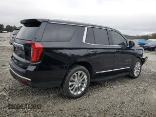 2023 GMC Yukon SLT with VIN 1GKS2BKD7PR122685, listed as a Copart auction lot 84611444 with 52,271 mi miles and Salvage Title. Bid and sale history available at carsss.com. Image 3.