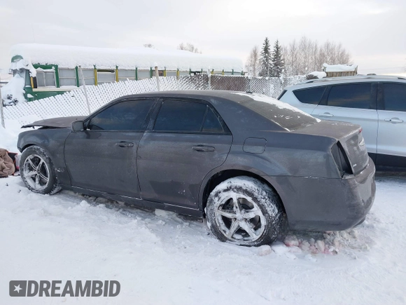 2014 Chrysler 300 with VIN 2C3CCAGG9EH297337, listed as a IAAI auction lot 41268387 with 104,542 mi miles. Bid and sale history available at carsss.com. Image 15.