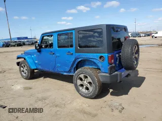 2016 Jeep Wrangler Unlimited 75th Anniversary with VIN 1C4BJWEG7GL172663, listed as a Copart auction lot 51305325 with 67,273 mi miles and Salvage Title. Bid and sale history available at carsss.com. Image 2.