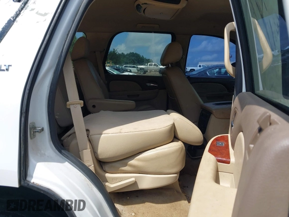2012 Chevrolet Tahoe LT z VIN 1GNSCBE00CR176056, wystawiony jako IAAI lot #42091159 z przebiegiem 216 650 mil mil oraz . Historia ofert i sprzedaży dostępna na DreamBid. Obrazek 8.