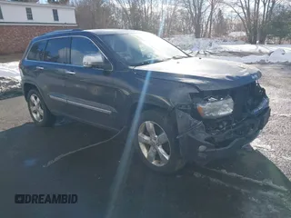 2013 Jeep Grand Cherokee Overland with VIN 1C4RJFCT3DC636378, listed as a IAAI auction lot 41477415 with 147,651 mi miles. Bid and sale history available at carsss.com. Image 1.