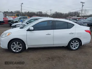 2014 Nissan Versa SV with VIN 3N1CN7AP6EL848965, listed as a IAAI auction lot 41810221 with 80,378 mi miles. Bid and sale history available at carsss.com. Image 13.