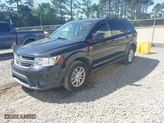 2015 Dodge Journey SXT with VIN 3C4PDCBG2FT560953, listed as a IAAI auction lot 42053264 with 127,463 mi miles. Bid and sale history available at carsss.com. Image 2.