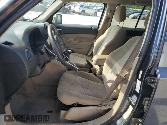 2014 Jeep Patriot Sport with VIN 1C4NJPBA8ED642323, listed as a Copart auction lot 60230985 with 167,240 mi miles and Salvage title. Bid and sale history available at DreamBid. Image 7.