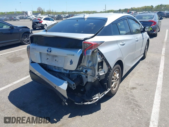 2018 Toyota Prius Two with VIN JTDKBRFU6J3603990, listed as a IAAI auction lot 42151090 with 71,388 mi miles and . Bid and sale history available at DreamBid. Image 4.