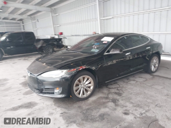 2017 Tesla Model S 60 z VIN 5YJSA1E17HF179051, wystawiony jako IAAI lot #42430013 z przebiegiem 201 174 mil mil oraz . Historia ofert i sprzedaży dostępna na DreamBid. Obrazek 22.