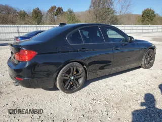 2013 BMW 3 Series 335i with VIN WBA3A9C53DF475504, listed as a Copart auction lot 79896964 with 104,859 mi miles and Salvage title. Bid and sale history available at DreamBid. Image 3.