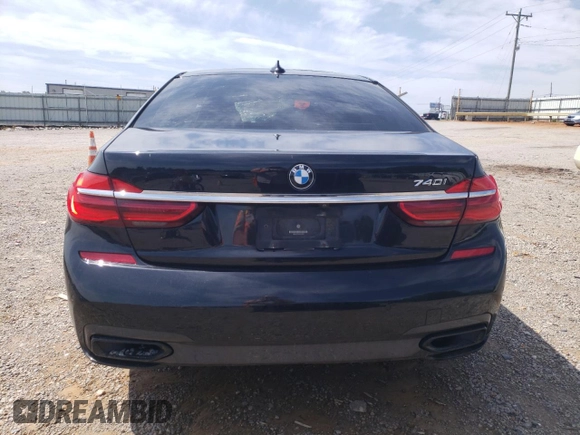 2016 BMW 7 Series 740i with VIN WBA7E2C59GG738509, listed as a Copart auction lot 52097993 with 0 mi miles. Bid and sale history available at carsss.com. Image 6.