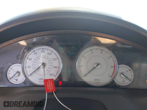2005 Chrysler 300 with VIN 2C3AA63HX5H125777, listed as a IAAI auction lot 41843281 with 115,034 mi miles. Bid and sale history available at carsss.com. Image 7.