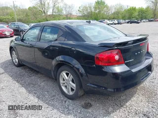 2014 Dodge Avenger SE z VIN 1C3CDZAG2EN232518, wystawiony jako IAAI lot #42157442 z przebiegiem 145 457 mil mil oraz . Historia ofert i sprzedaży dostępna na DreamBid. Obrazek 3.