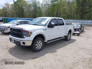 2011 Ford F-150 XLT with VIN 1FTFW1CT5BFC17998, listed as a IAAI auction lot 41968678 with 255,437 mi miles. Bid and sale history available at carsss.com. Image 2.