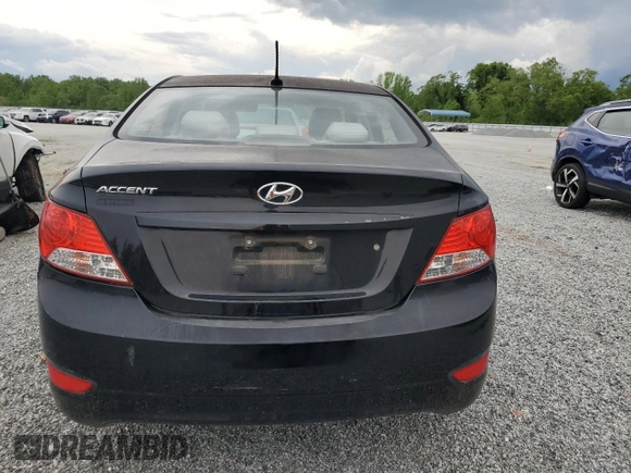 2012 Hyundai Accent GLS z VIN KMHCT4AEXCU041024, wystawiony jako Copart lot #54057455 z przebiegiem 219 530 mil mil oraz Szkody całkowita. Historia ofert i sprzedaży dostępna na DreamBid. Obrazek 6.