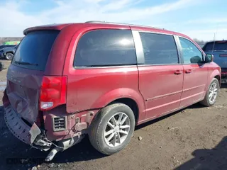 2015 Dodge Grand Caravan SXT Plus with VIN 2C4RDGCG0FR585027, listed as a IAAI auction lot 41581723 with 195,601 mi miles. Bid and sale history available at carsss.com. Image 4.