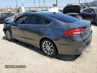 2017 Ford Fusion Hybrid SE with VIN 3FA6P0LU0HR355272, listed as a Copart auction lot 62834325 with 147,572 mi miles and Clean title. Bid and sale history available at DreamBid. Image 2.