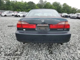 2000 Honda Accord EX z VIN 1HGCG1659YA073599, wystawiony jako Copart lot #58899565 z przebiegiem 389 828 mil mil oraz Szkoda całkowita • Salvage title. Historia ofert i sprzedaży dostępna na DreamBid. Obrazek 6.