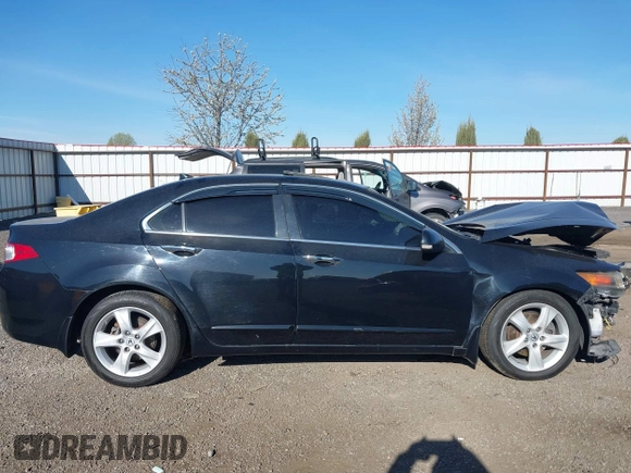 2009 Acura TSX with VIN JH4CU26659C021235, listed as a IAAI auction lot 42014591 with 201,036 mi miles. Bid and sale history available at carsss.com. Image 14.