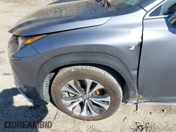 2021 Lexus NX with VIN JTJSARDZ8M2253108, listed as a IAAI auction lot 41790614 with 106,216 mi miles. Bid and sale history available at carsss.com. Image 12.